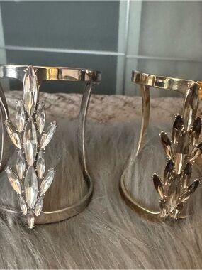 BCBGMaxAzria Silver and Gold Crystal Leaf Cuff Bracelets Pair